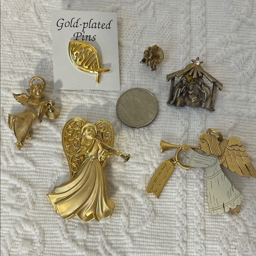 Brooches of Gold Angels, a Jesus pin, and Nativity Pin. Mini collection
